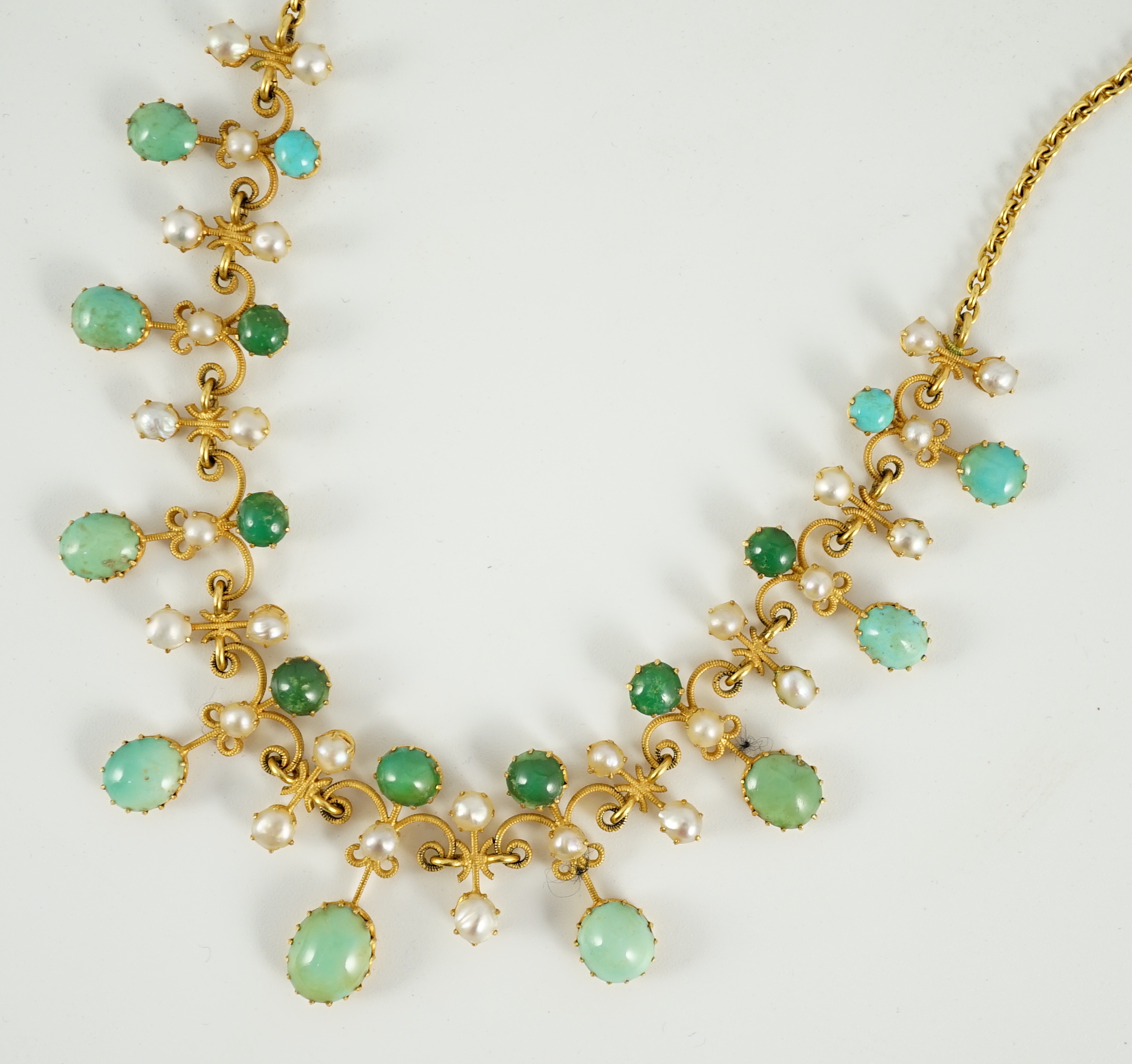 A cased Edwardian gold, turquoise and split pearl set necklace